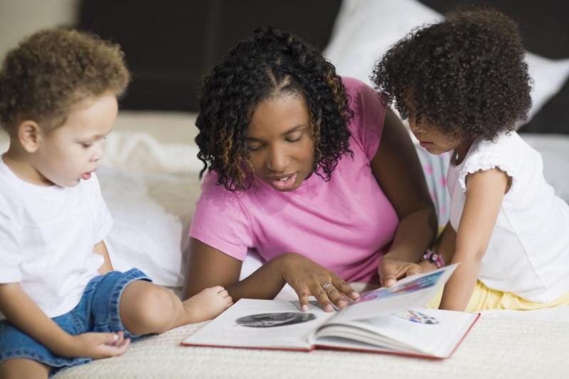 Mom and kids reading