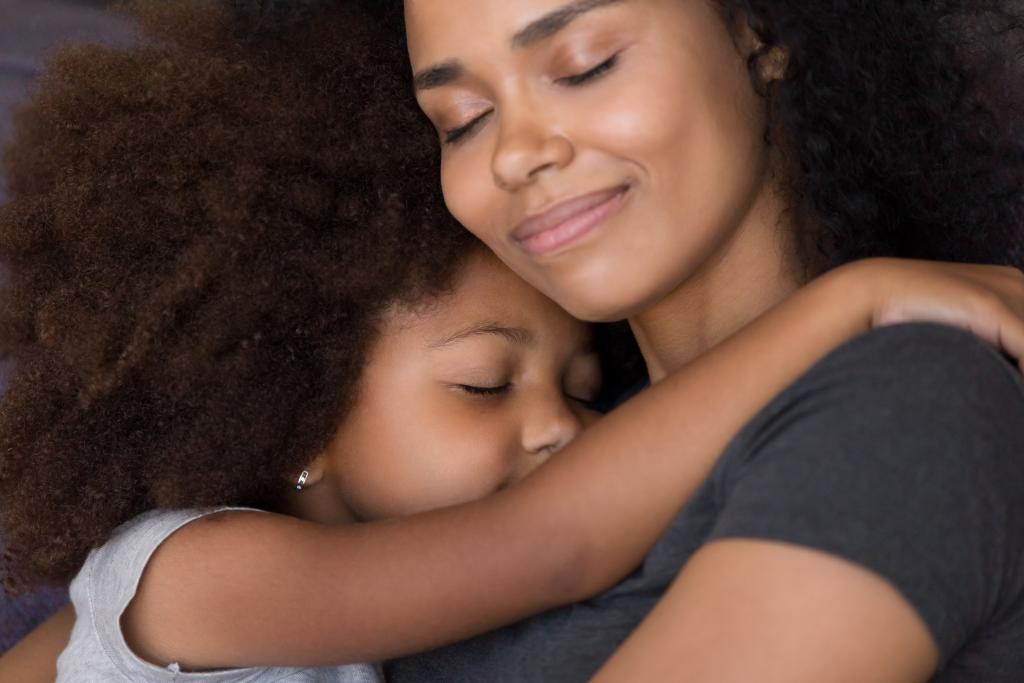 African-American mother and young daughter