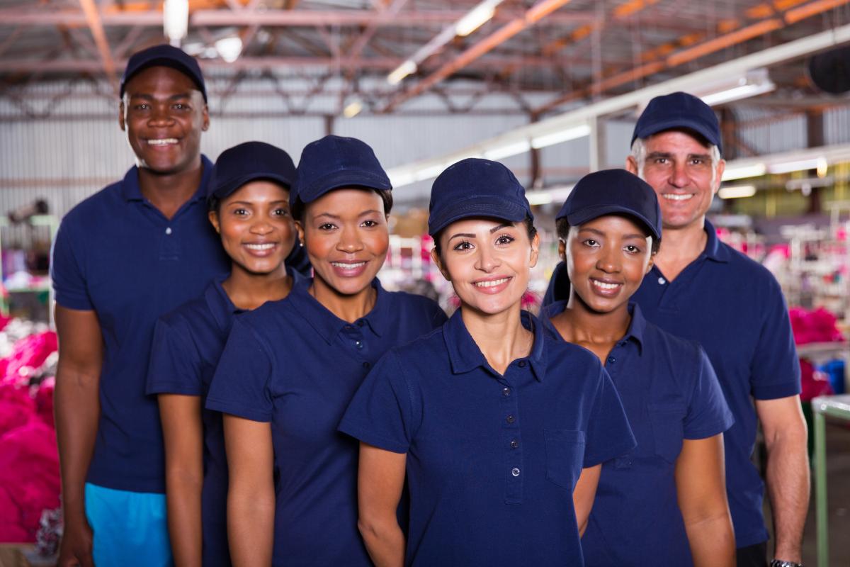 group of workers wearing blue shirts